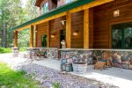 This home features beautiful wood and rock work